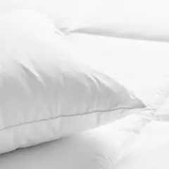 Jakie poduszki są w hotelach? Odkryj komfort i higienę snu