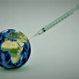 Szczepienia na świecie, jakby Ziemia otrzymywała dawkę leku. Może to symbolizować globalne szczepienia, w tym te w Meksyku.